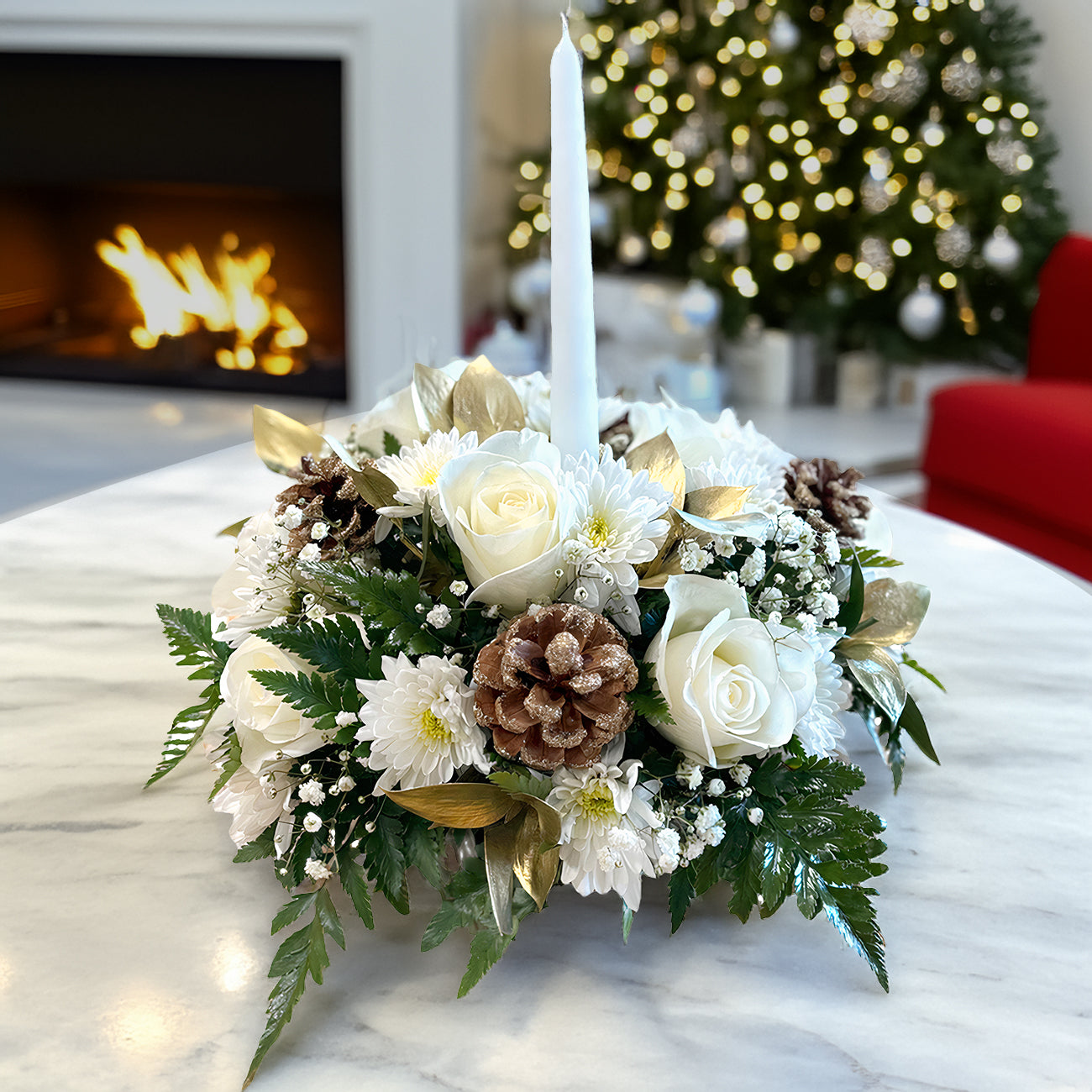 Days Flowers Florida: Serene Christmas arrangement with white roses, frosted pinecones, and golden leaves. Peace and hope gift delivery in Port St. Lucie.