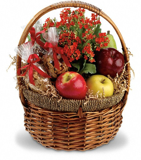 Health Nut Basket by Days Flowers Florida featuring fresh apples, green pear, mixed nuts, peanuts, trail mix, basket shred, and red satin ribbon in a natural round basket with handle.