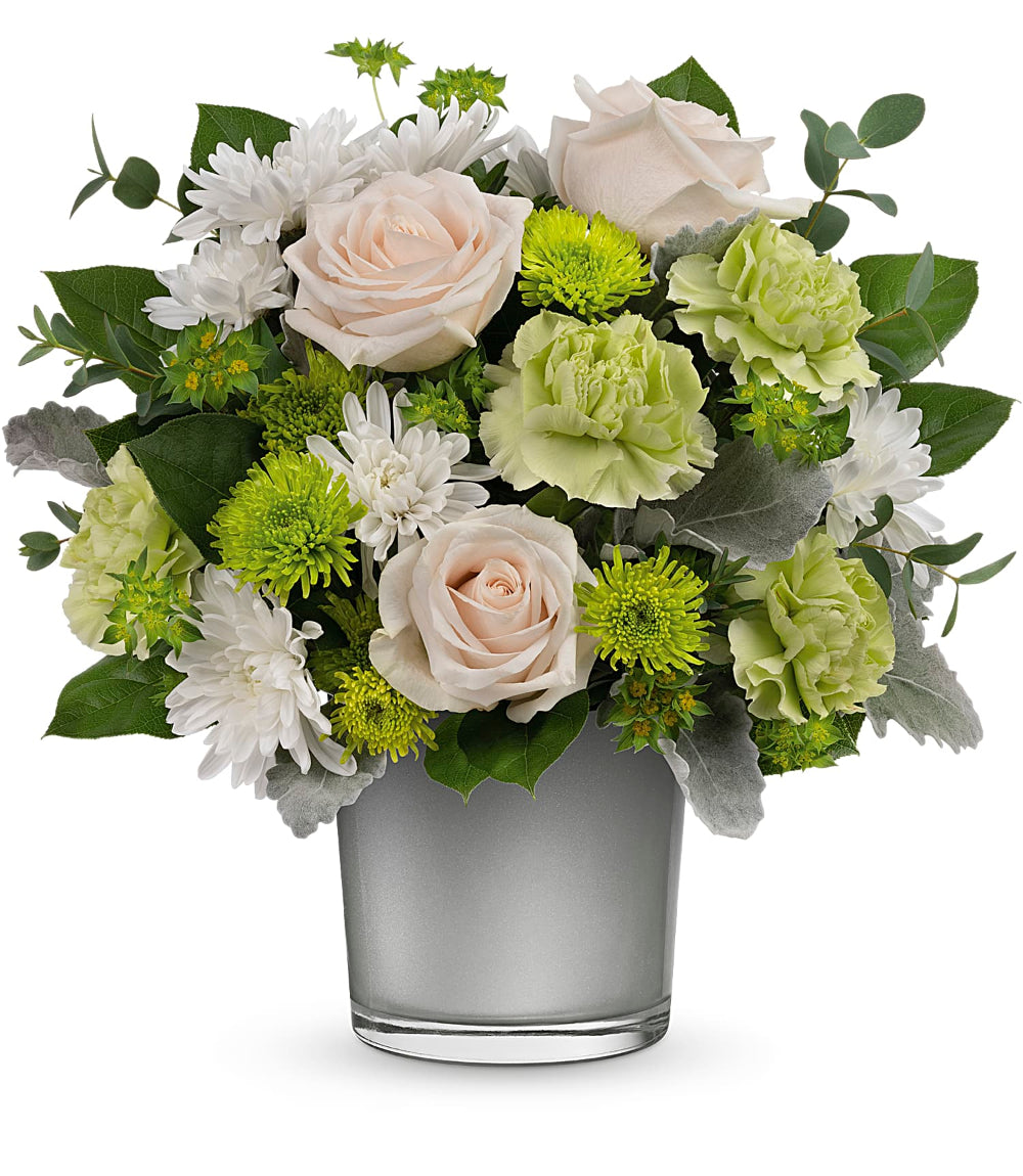 Light On The Water Bouquet by Days Flowers Florida featuring crème roses, green carnations, green and white chrysanthemums, dusty miller, eucalyptus, and fresh greenery in a silver glass keepsake vase, ideal for sympathy and elegant floral gifts in Summerfield and The Villages.