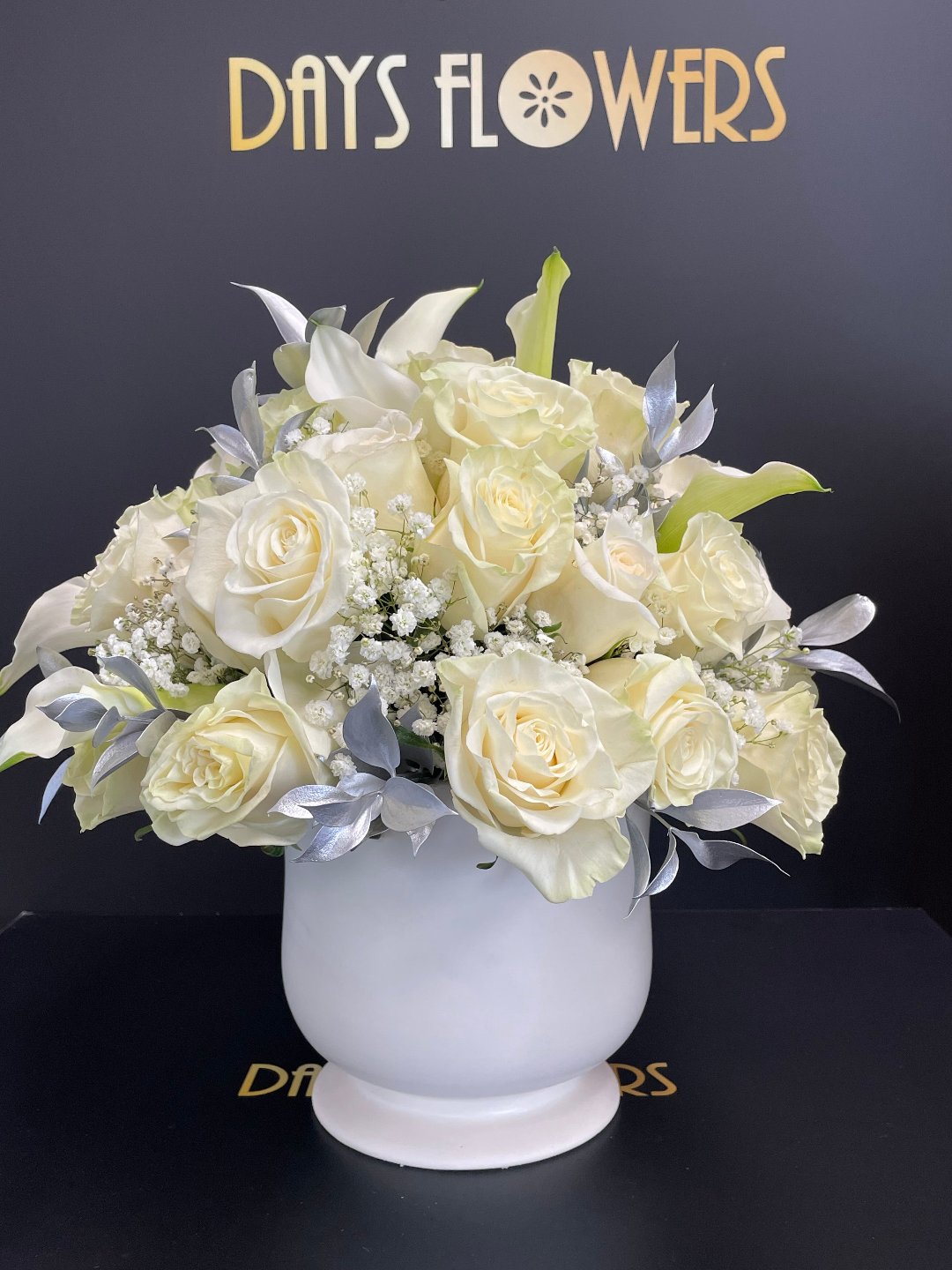 Elegant white rose bouquet with baby’s breath, free delivery in Florida