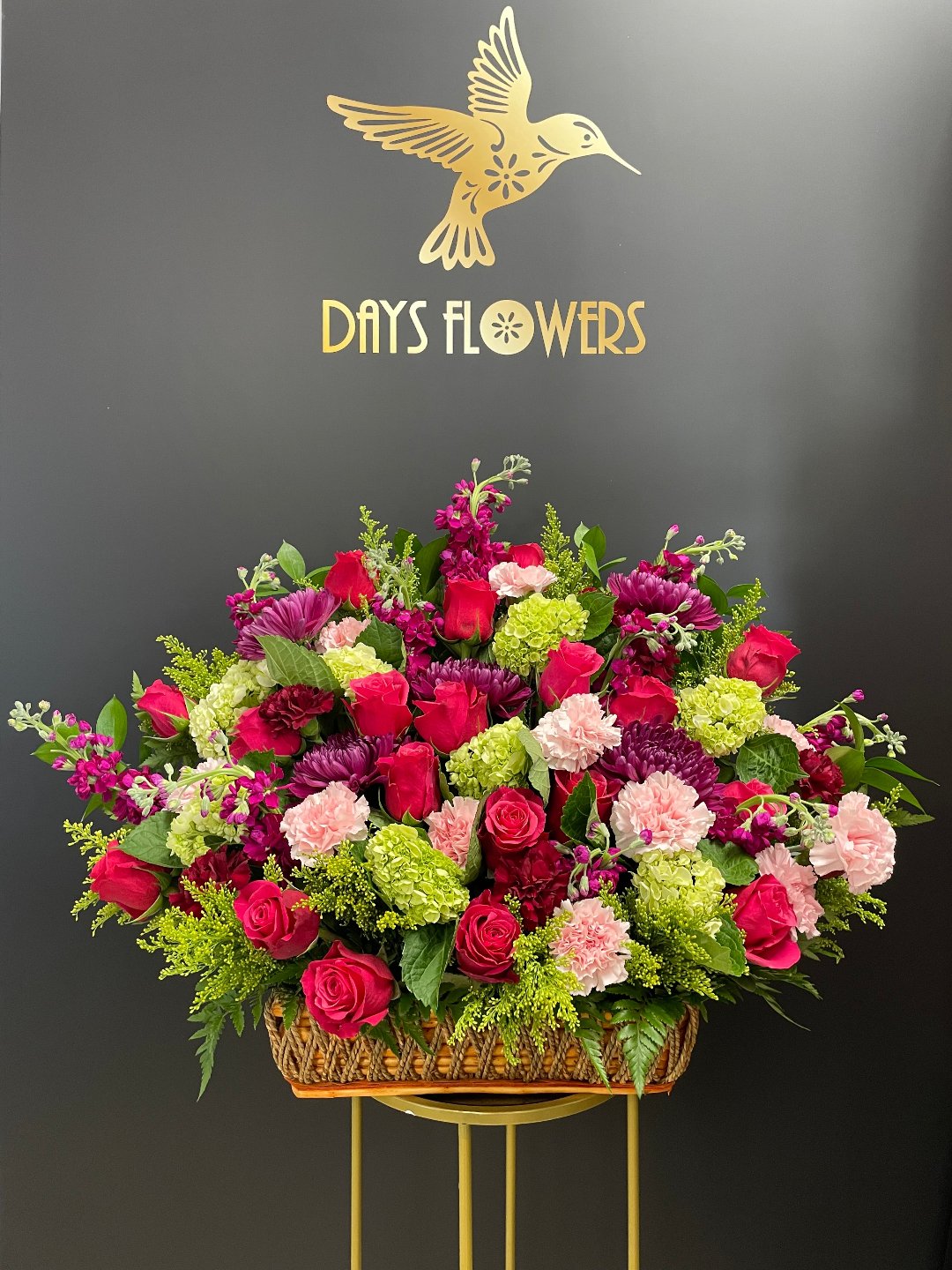 Vibrant floral arrangement by Days Flowers, free delivery in Summerfield, Ocala, Orlando, The Villages, Port St. Lucie.