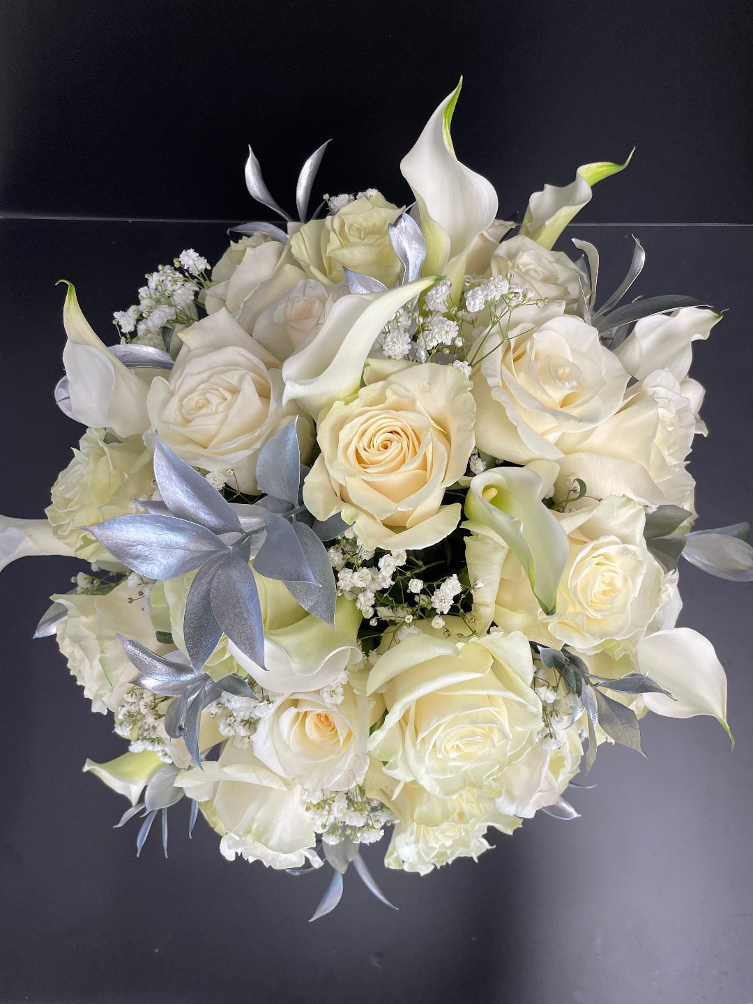 Elegant white and silver flowers, perfect for gifting in Florida