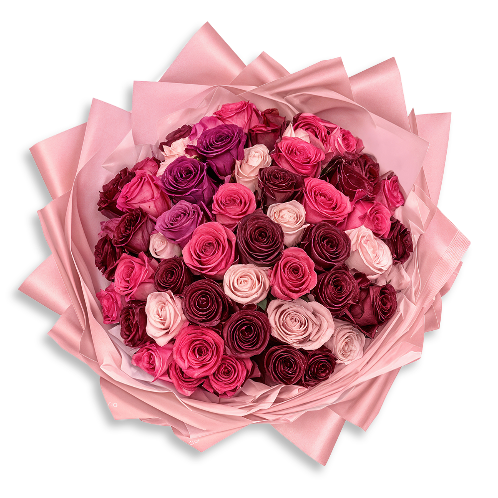 Pink Heart Bouquet featuring fuchsia, pink, and burgundy roses wrapped in pink satin paper by Days Flowers Florida.