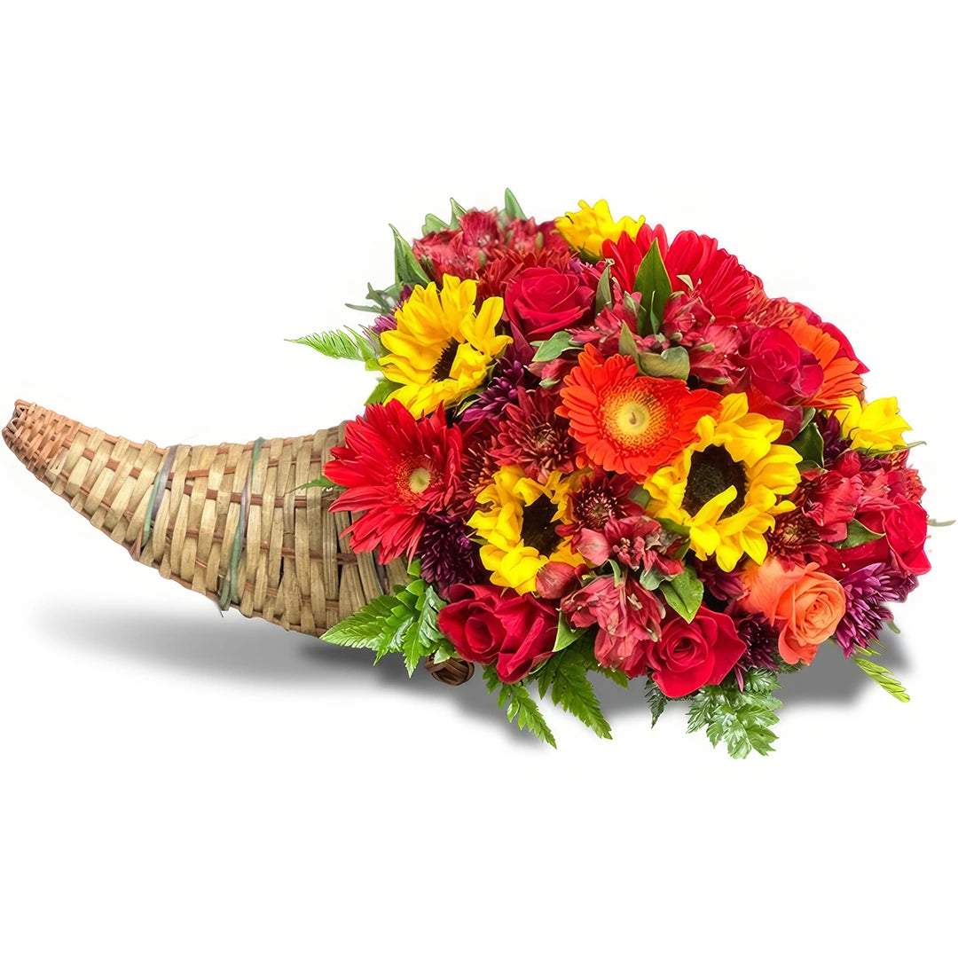 Days Flowers Florida: Thanksgiving cornucopia arrangement with gerberas, sunflowers, and roses. Warm autumn centerpiece delivery in Summerfield, FL.