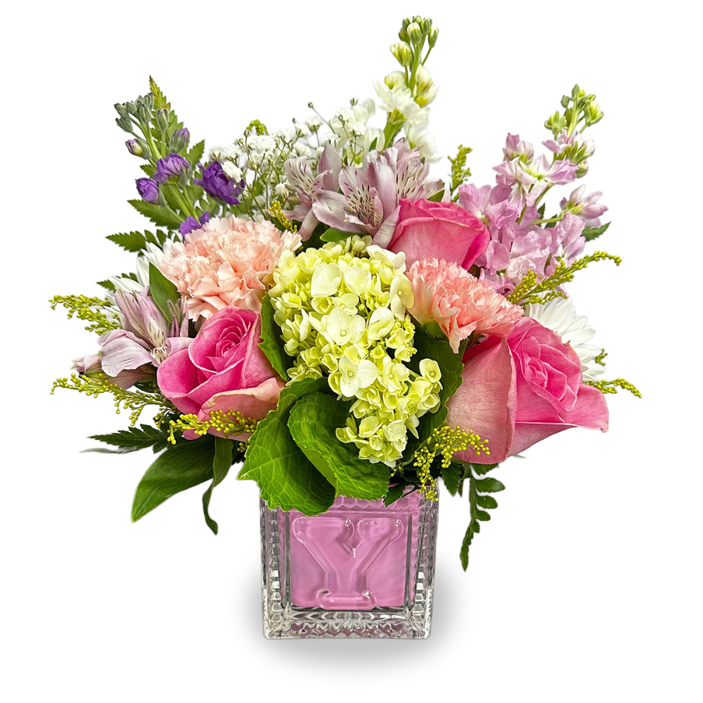Blossom and Lullabies baby flower arrangement with pink roses, peach carnations, and white daisies in a pink glass vase by Days Flowers Florida.