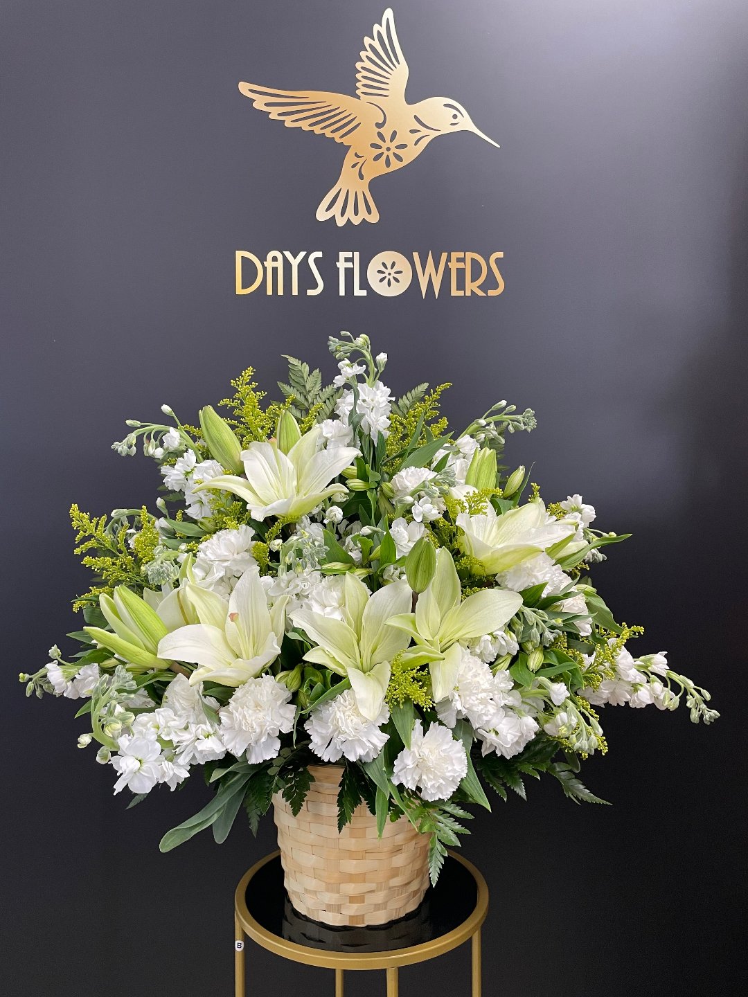 Elegant white and green floral arrangement from Days Flowers