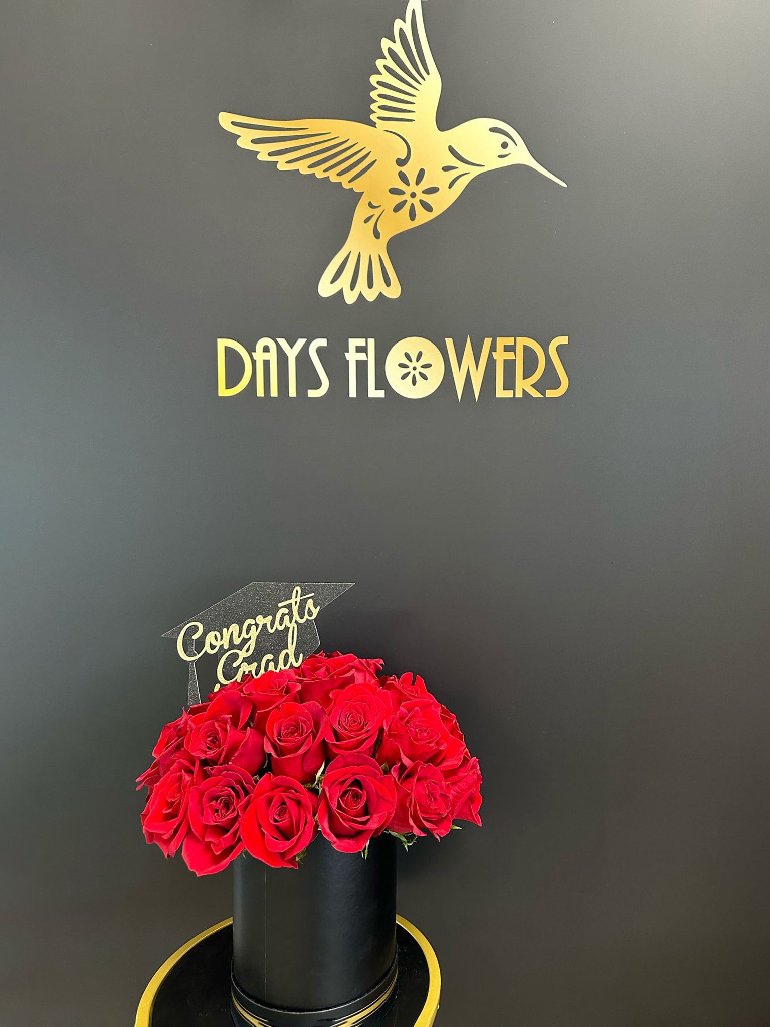 Days Flowers Florida: Breathtaking red roses bouquet for Prom Night and Graduation. Exquisite floral display gift delivery in Port St. Lucie.