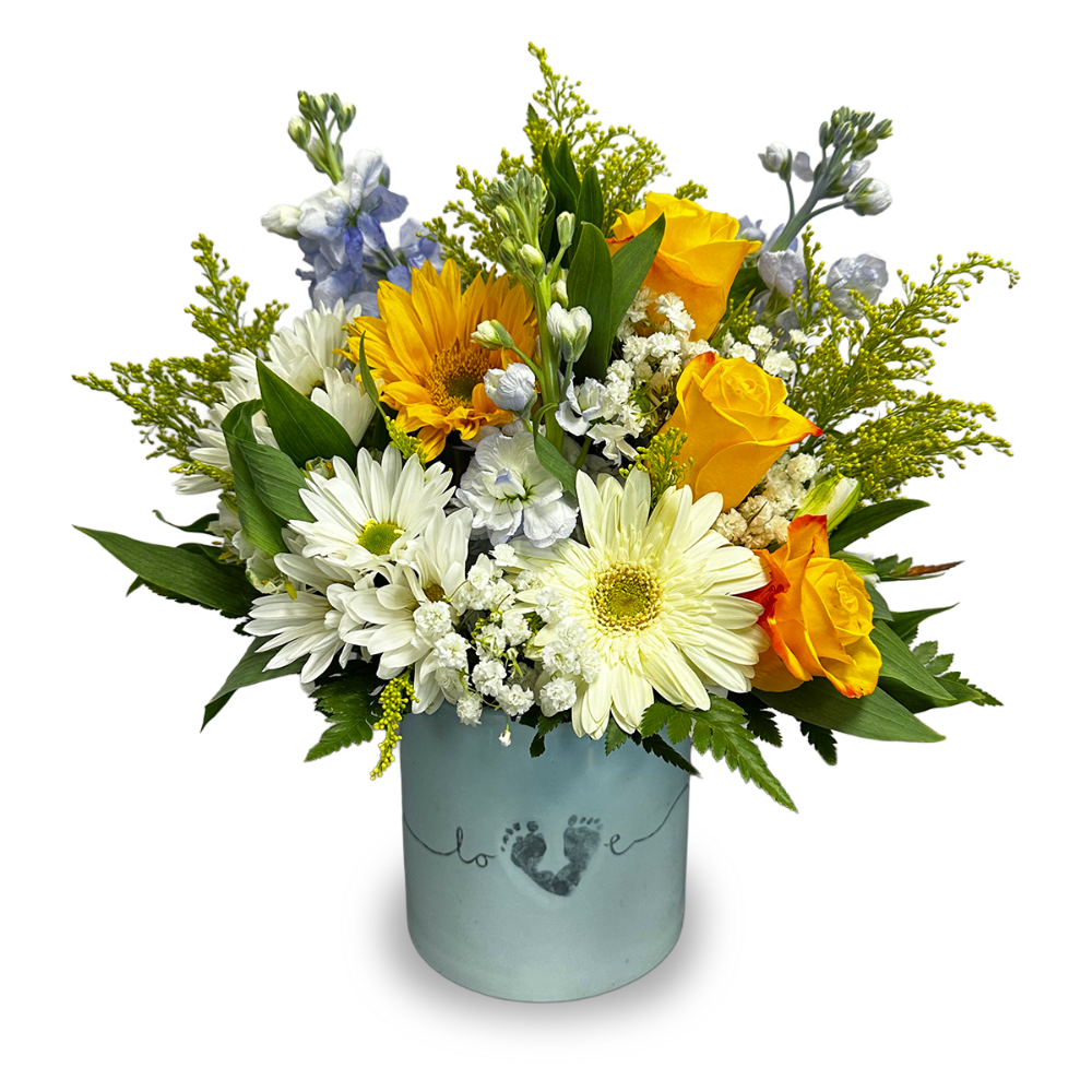 Footprints of Joy baby flower arrangement featuring a bright sunflower, yellow roses, and white daisies in a blue footprint ceramic vase by Days Flowers Florida.