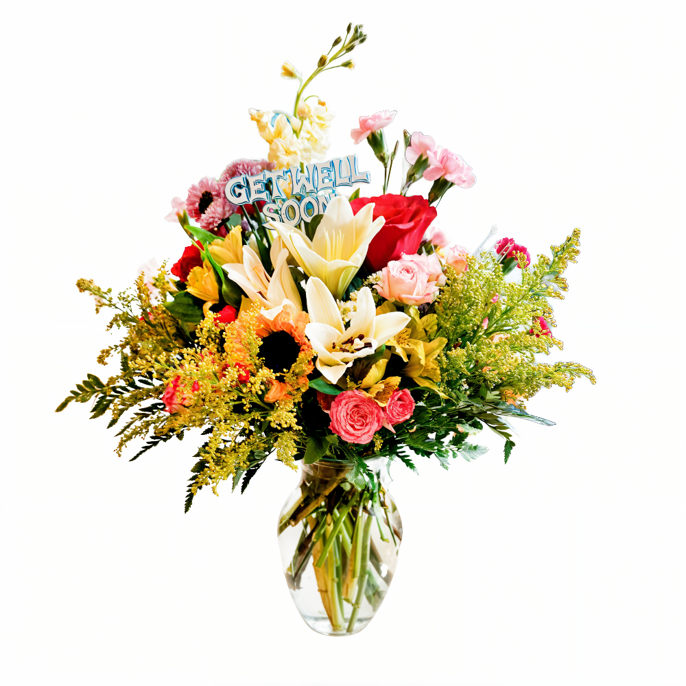 Healing Sunshine get well soon flower arrangement with sunflowers, white lilies, and pink roses in a glass vase by Days Flowers Florida.