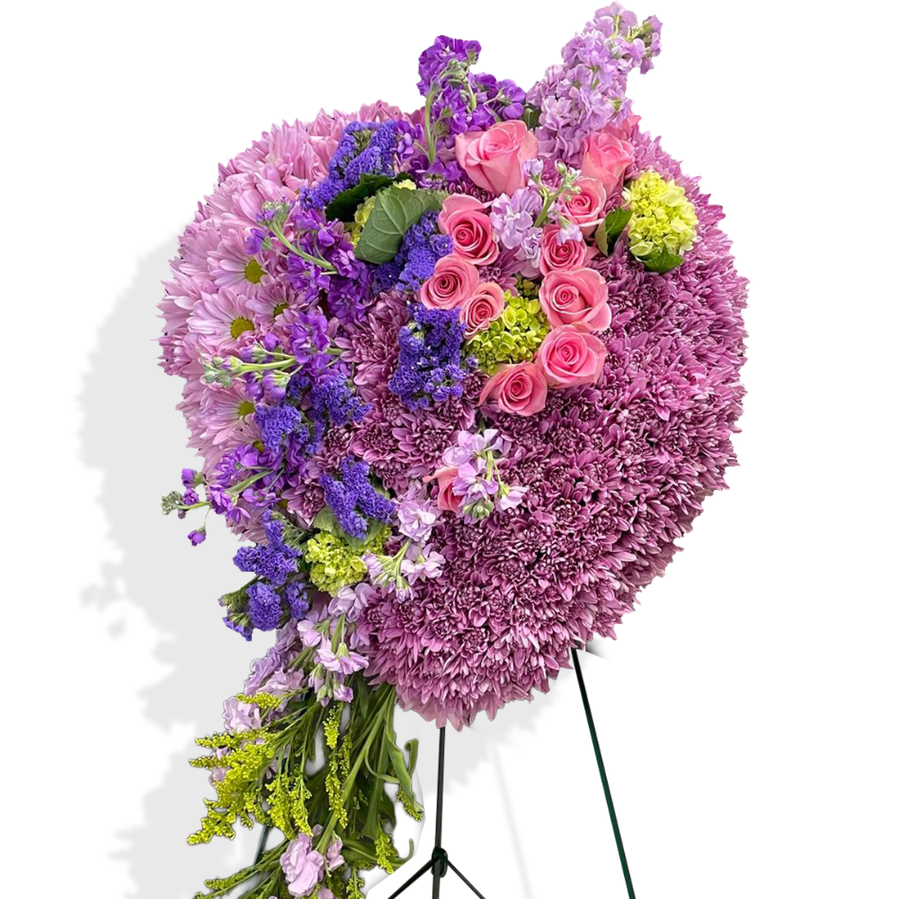Heart of Serenity heart-shaped funeral flower arrangement with pink roses and purple chrysanthemums by Days Flowers Florida