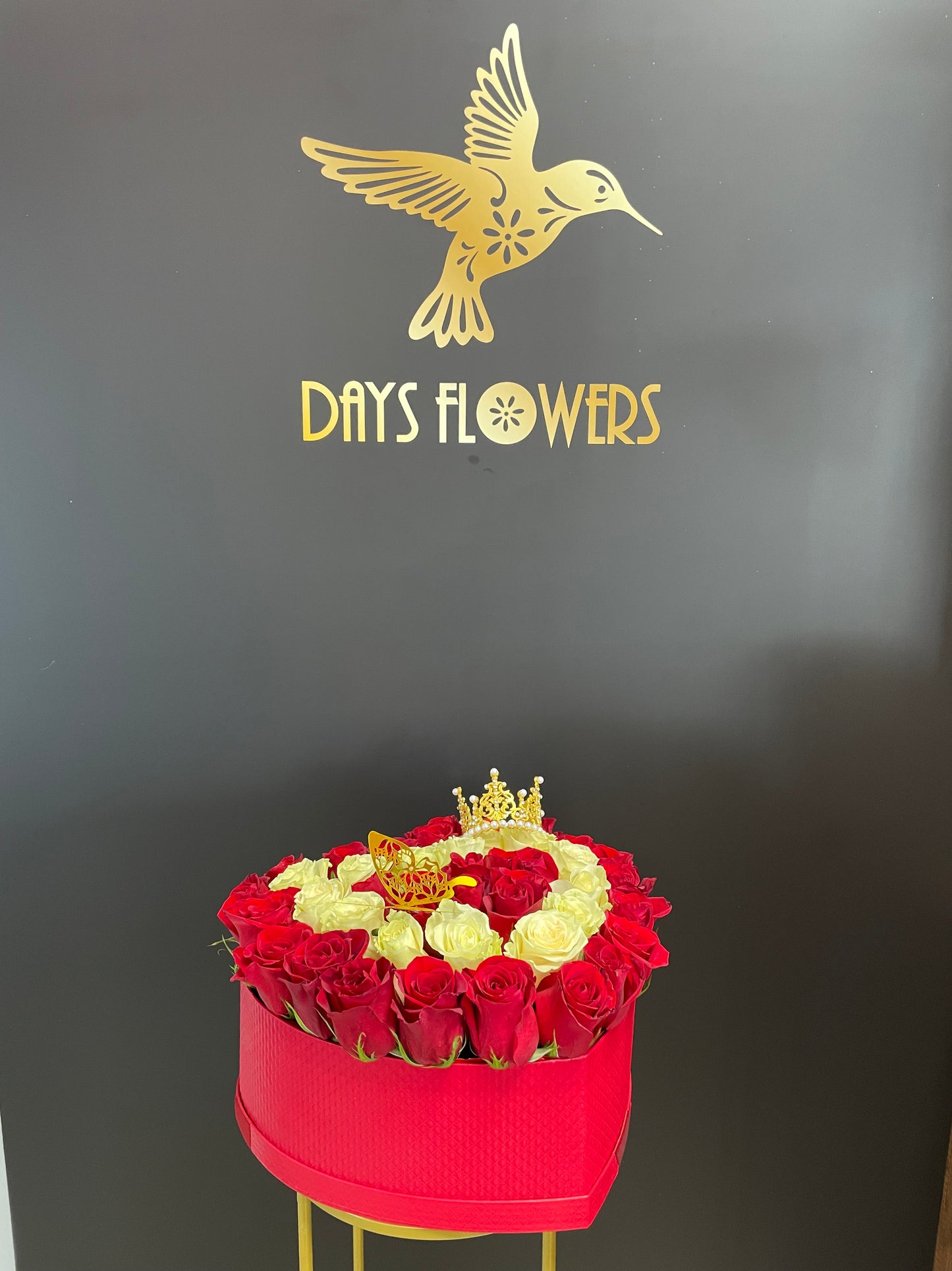 Days Flowers Florida: Luxury 40-rose bouquet with red/white roses and opulent crown. Grandeur emotions gift delivery in Port St. Lucie, Florida.