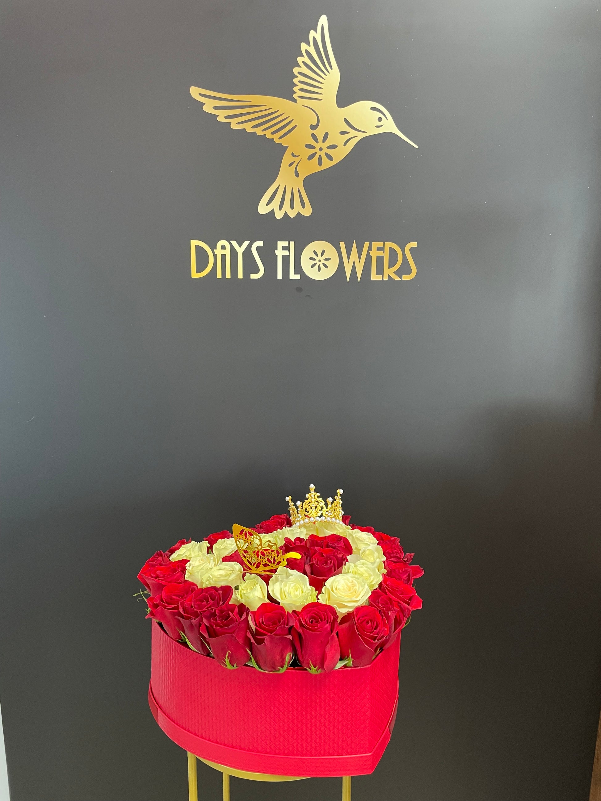 Days Flowers Florida: Luxury 40-rose bouquet with red/white roses and opulent crown. Grandeur emotions gift delivery in Port St. Lucie, Florida.