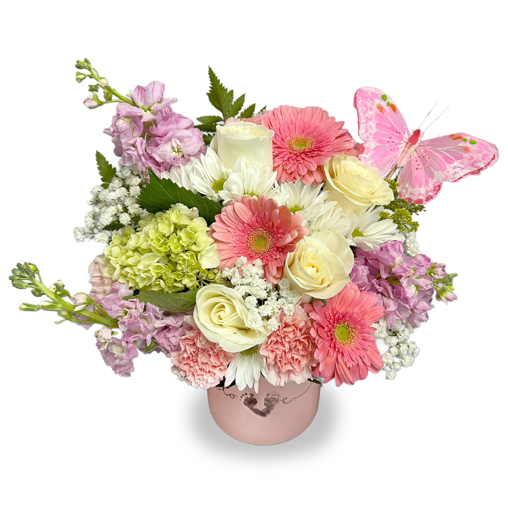 Close-up detail of the pink glass vase showing the baby footprints artwork and fresh light green hydrangeas