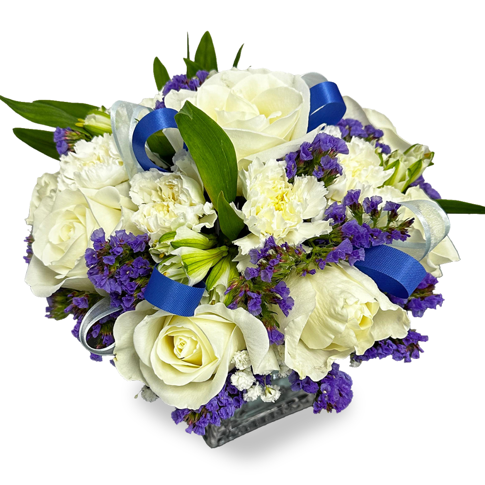 Top-down view of the Little Lavender Love bouquet highlighting the contrast of purple statice and fresh green foliage