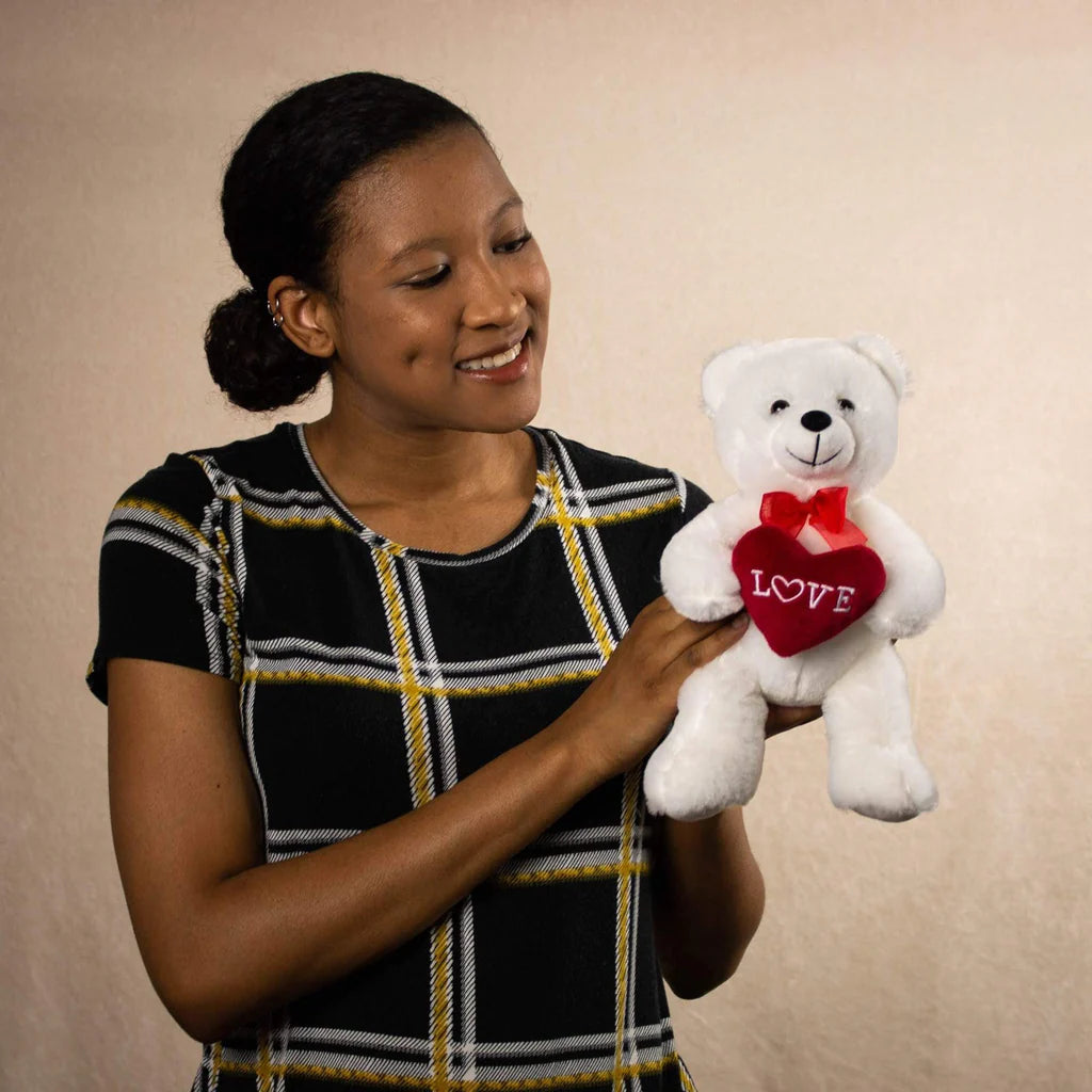 Days Flowers Florida: Plain white teddy bear with red 'Love' heart. Small, sweet, hypoallergenic plush gift delivery in Port St. Lucie, Florida.