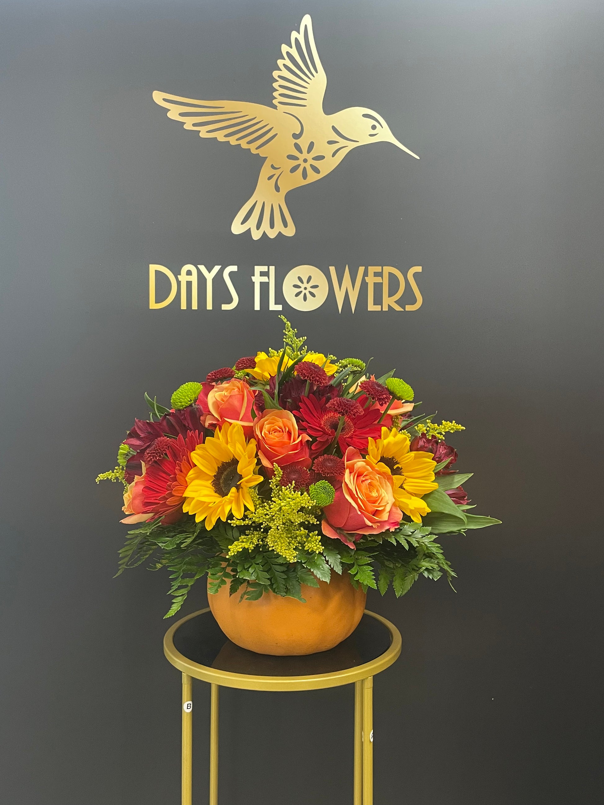 Days Flowers Florida: Halloween Pumpkin Bouquet. Striking contrast of colors and dark accents. Seasonal gift delivery in Summerfield, Florida