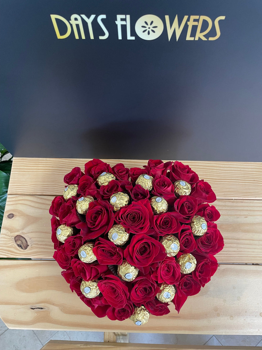 High-end display of the Romance in a Box floral set by Days Flowers Florida, tailored as a stunning surprise centerpiece gift for marriage proposals and special date nights.