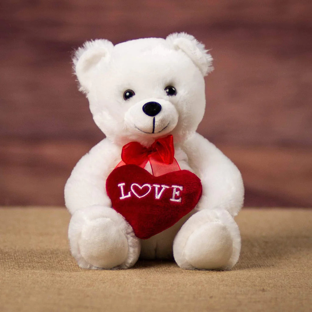 Days Flowers Florida: Soft white teddy bear holding a bright red 'Love' heart. Cuddly 10-inch plush gift delivery in Summerfield, FL.