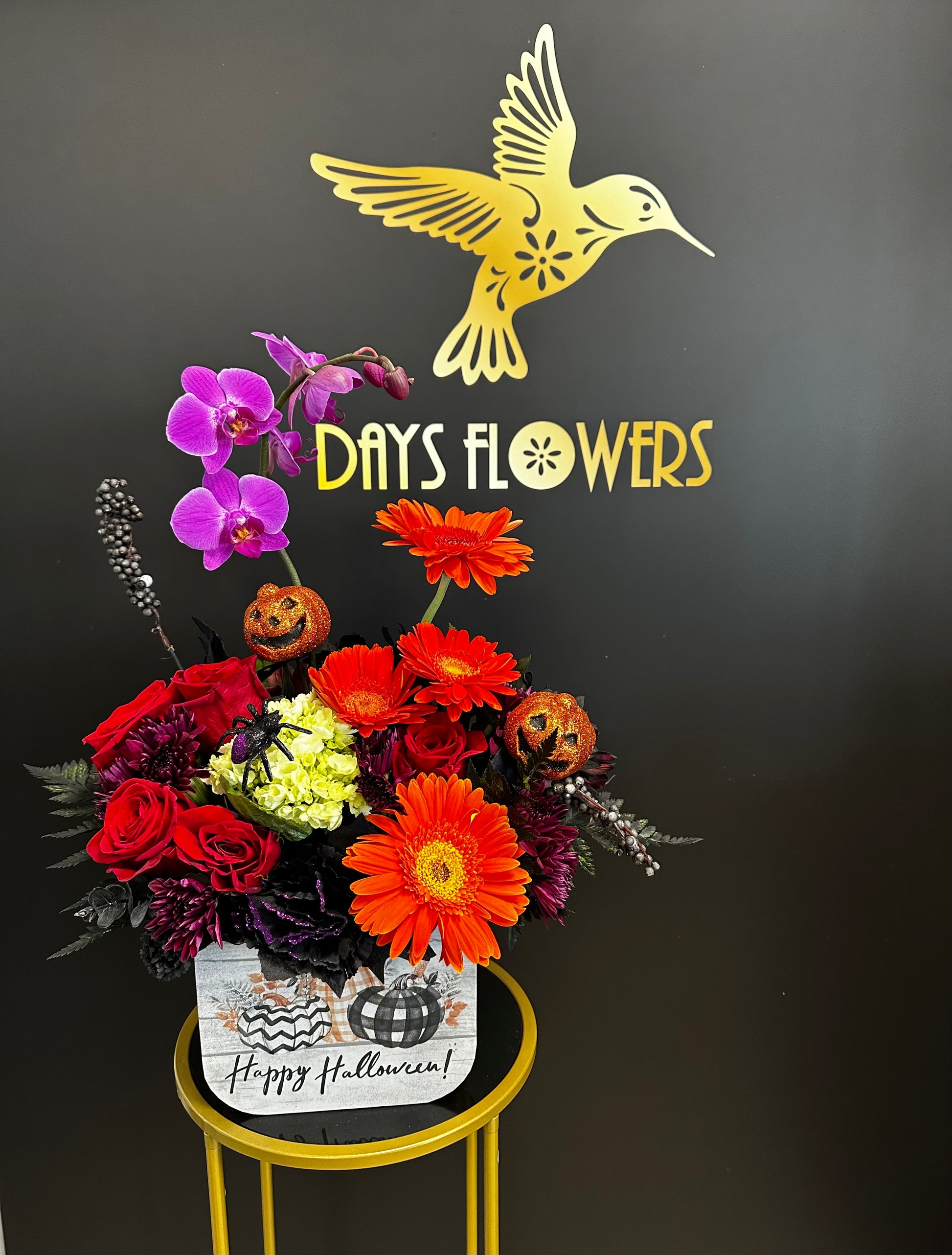 Days Flowers Florida: Spooking Sweet Bouquet. Playful Halloween arrangement adds seasonal color and elegance. Treat yourself or others in Summerfield, Florida.