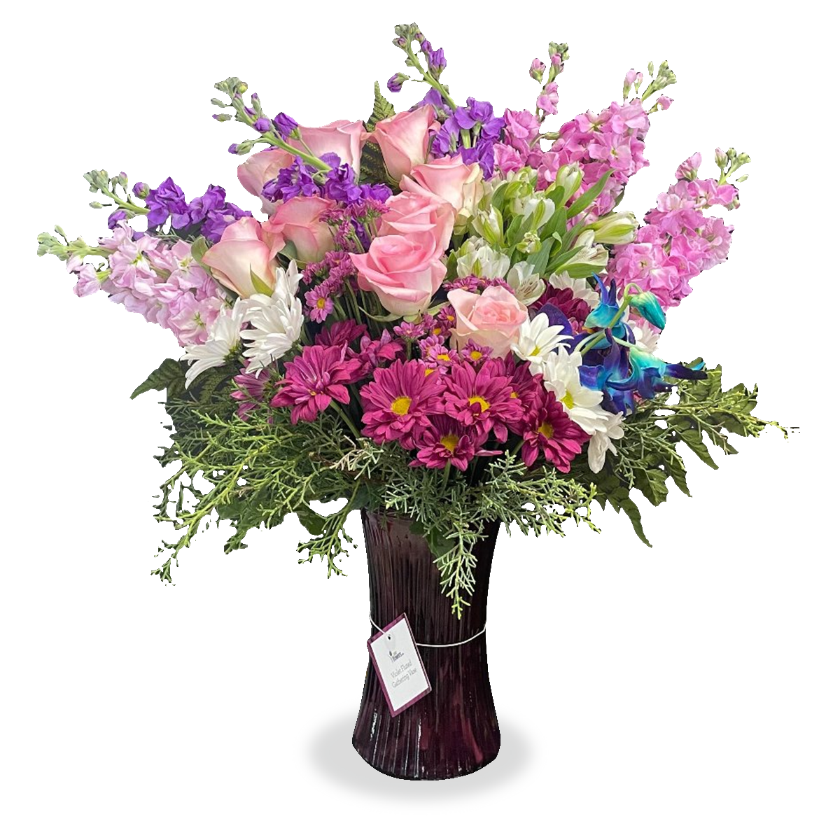 Steal the Show tall flower arrangement by Days Flowers Florida, displaying beautiful lavender roses and light pink snapdragons arranged with fresh greens in a clear luxury vase.