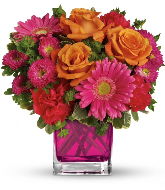 Days Flowers Florida: Hot pink, haute couture arrangement in a fuchsia Cube vase. Chic roses, gerberas, and carnations. Fun gift delivery in Ocala, FL.