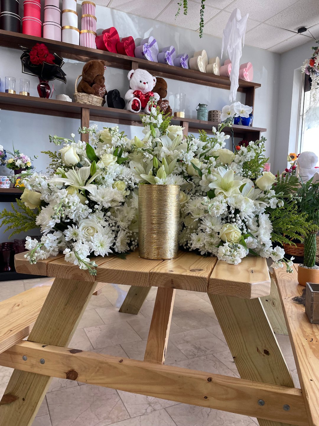 Elegant white floral arrangement in gold vase, perfect gift with free delivery in Florida areas.