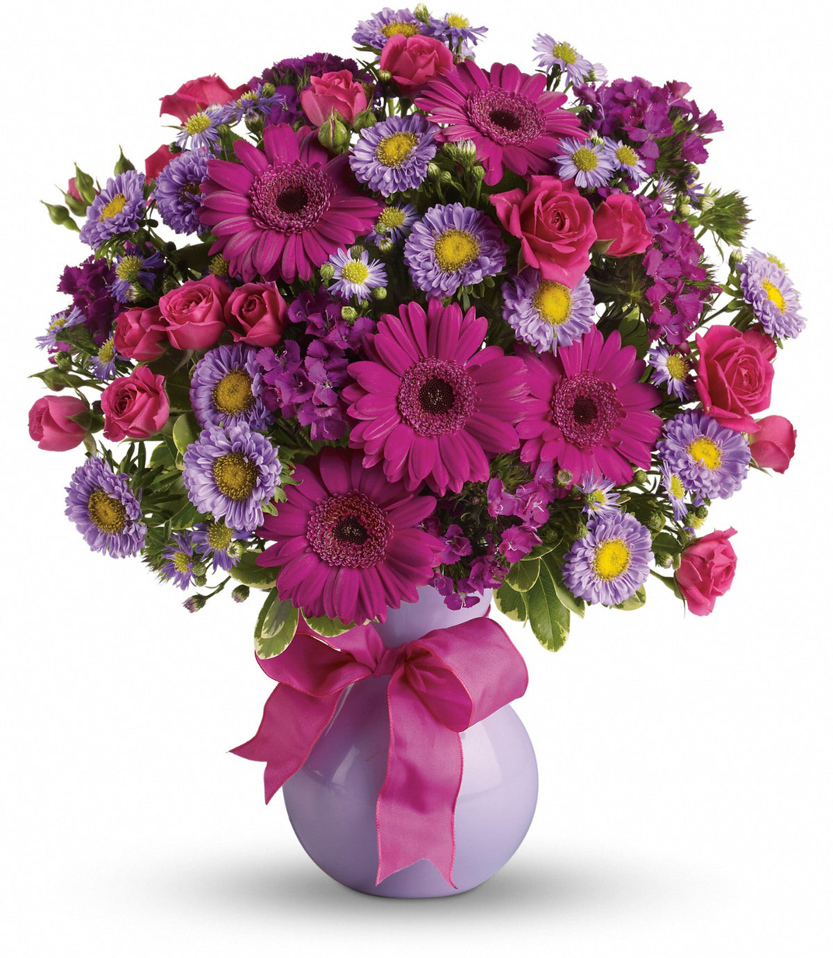 Top-down perspective of the Joyful Jubilee arrangement showing the dense placement of hot pink spray roses and Sweet William