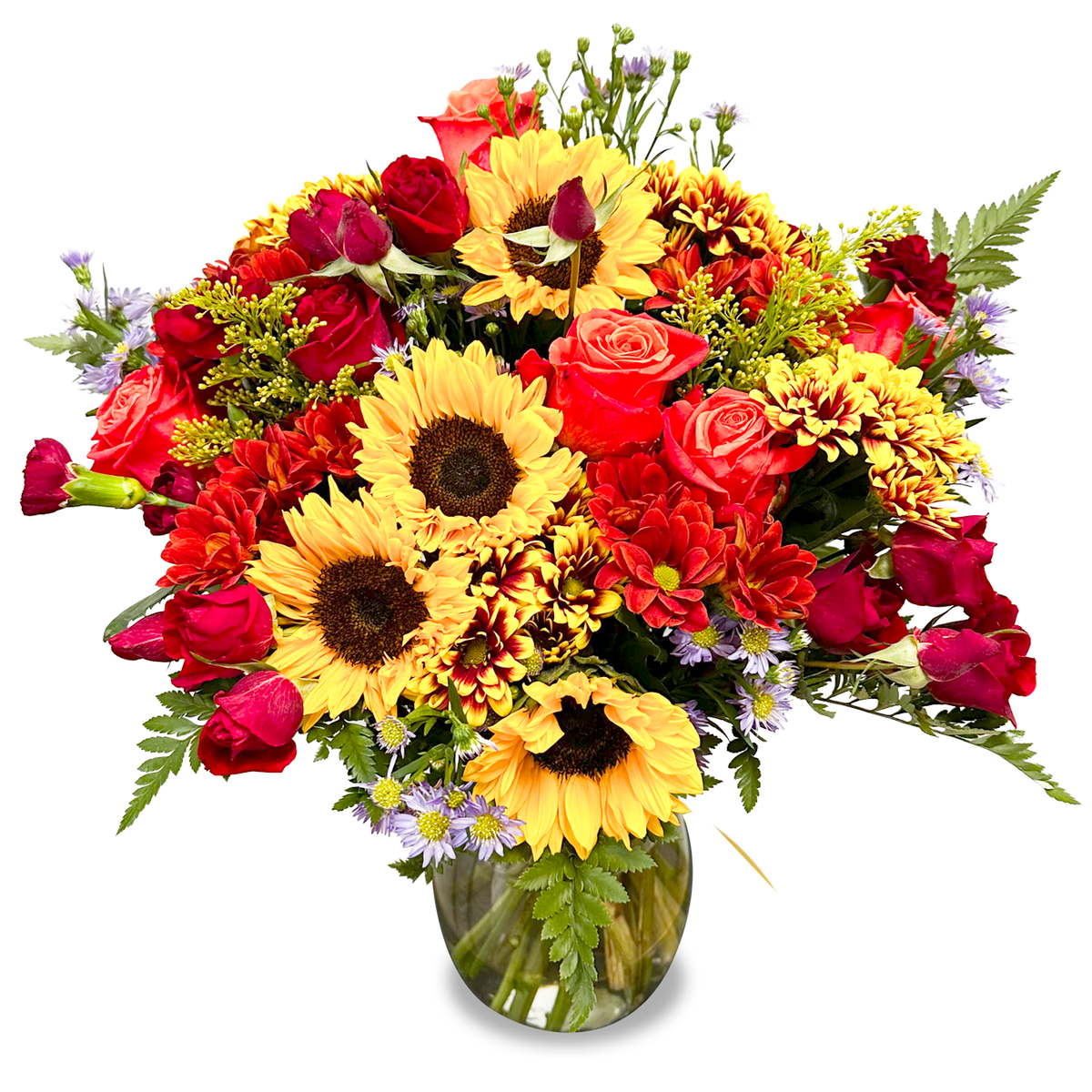Close-up of an elegant clear glass vase displaying a large yellow sunflower with a dark center and green foliage