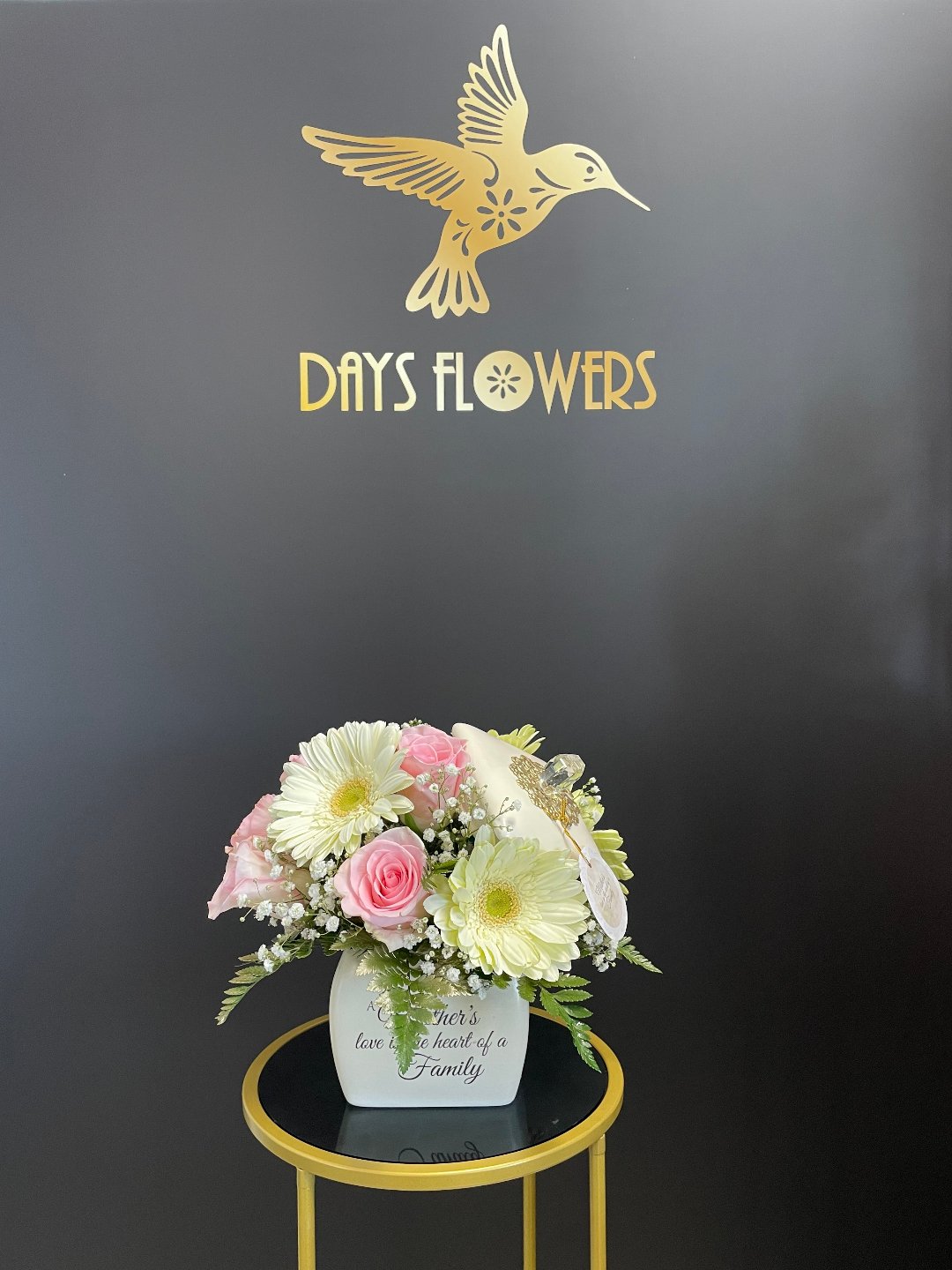 Elegant white and pink floral arrangement in a vase with “Days Flowers” logo, perfect for delivery in Summerfield, Ocala, Orlando, The Villages, and Port St. Lucie.