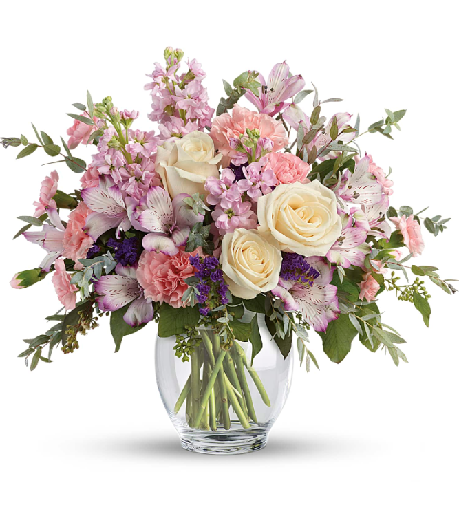 Elegant bouquet of pink and white flowers, including roses and lilies, in a clear glass vase, available for delivery in Summerfield, Ocala, Orlando, The Villages, and Port St. Lucie.