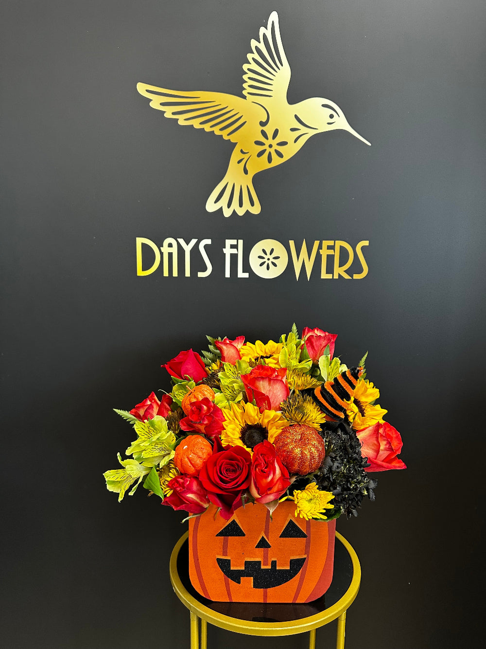 Top-down perspective of the Halloween Magic bouquet showing a rich arrangement of autumn blooms