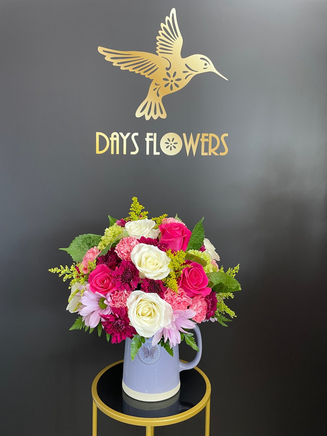 Vibrant floral arrangement by Days Flowers, free delivery in Summerfield, Ocala, Orlando, The Villages, Port St. Lucie.