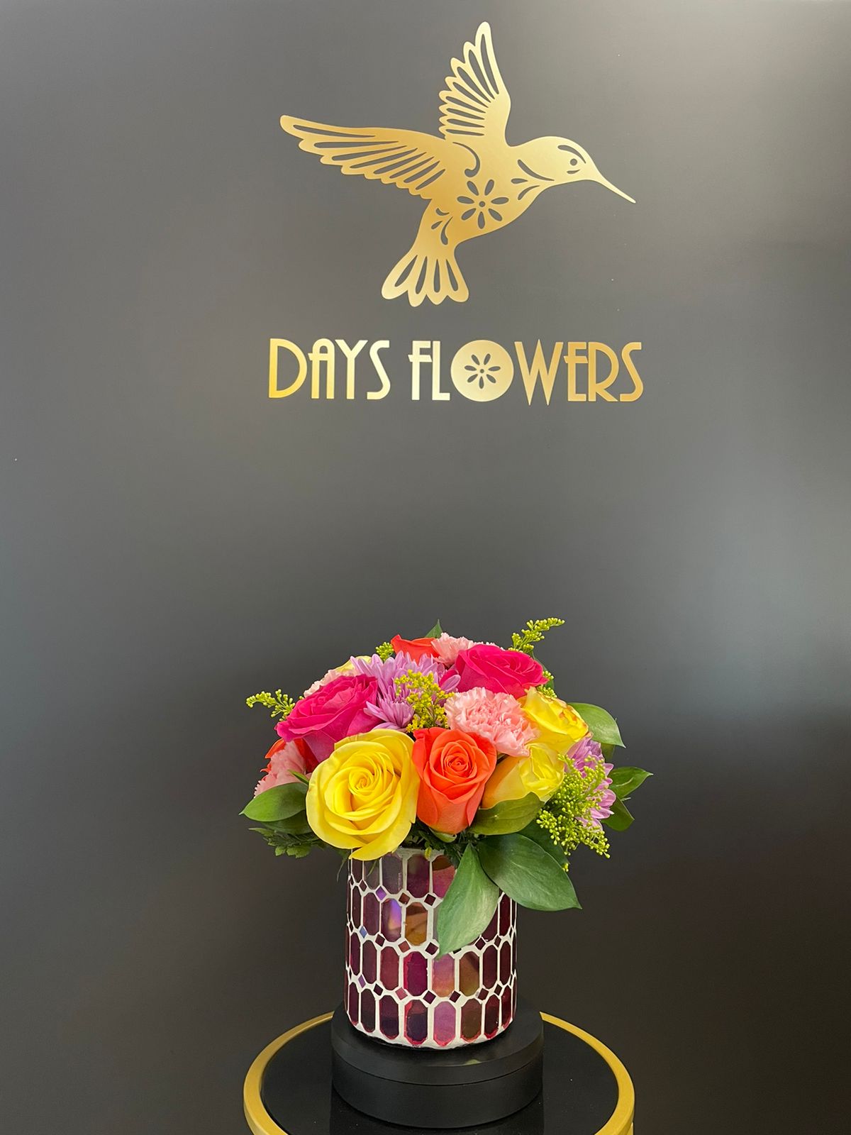 Vibrant floral arrangement by Days Flowers, free delivery in Summerfield, Ocala, Orlando, The Villages, Port St. Lucie.