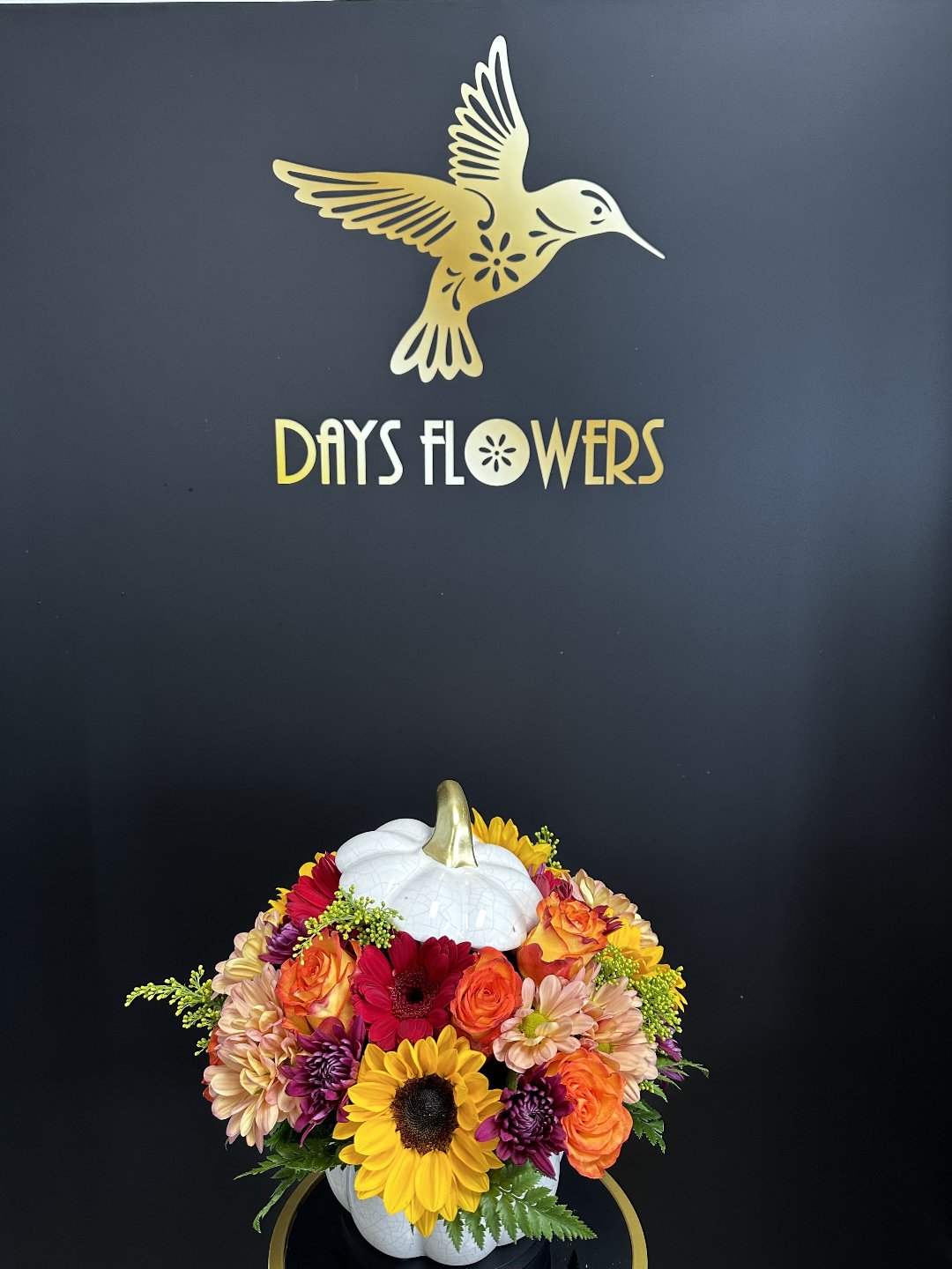 Elegant floral arrangement with sunflowers, roses, and lilies, perfect gift from Day’s Flowers in Florida.