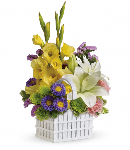 Garden's Gifts Bouquet featuring white asiatic lilies, yellow gladioli, and pink carnations in a white picket fence basket by Days Flowers Florida