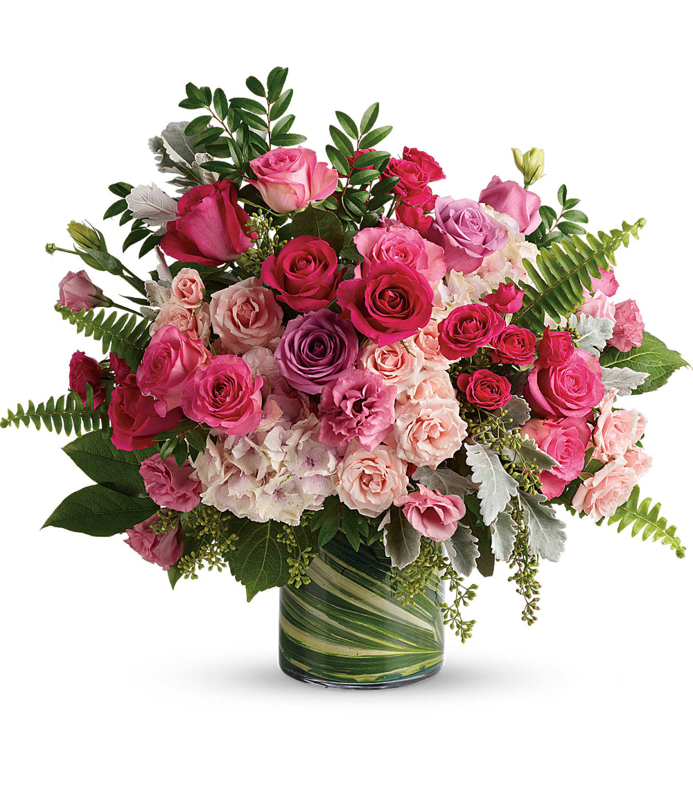 Haute Pink Bouquet featuring 60cm hot pink and lavender roses, light pink hydrangeas, and lisianthus in a large cylinder vase by Days Flowers Florida