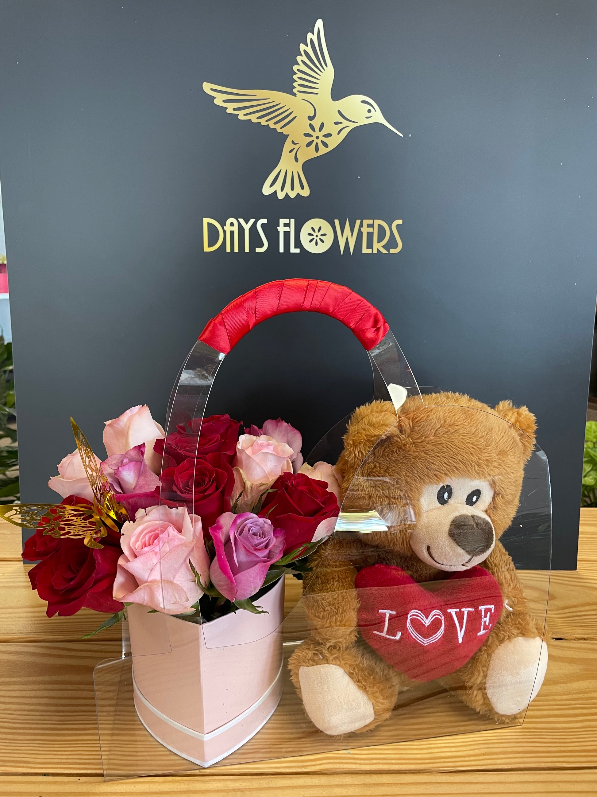 Days Flowers Florida: Blooming Embrace Bundle: 10 exquisite roses, teddy bear, and lush greenery. Express love and affection gift delivery in Summerfield, Florida.