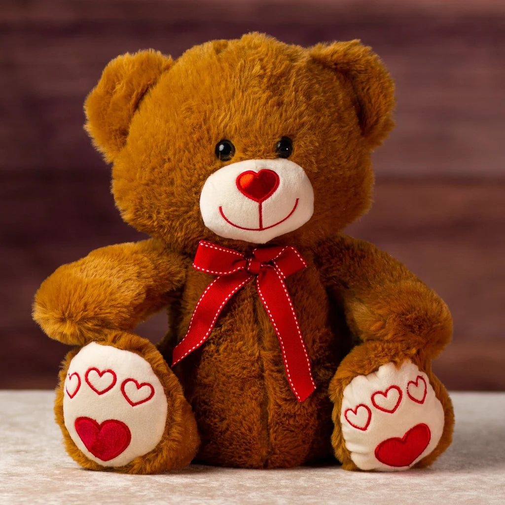 Days Flowers Florida: Cuddly medium-sized teddy bear (14.5 inches) with heart details on nose and paws. Adorable plush gift delivery in Port St. Lucie.