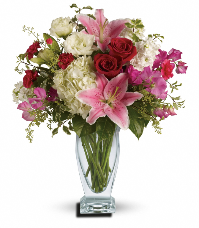 Elegant glass vase with pink lilies, red roses, and white flowers, perfect for free delivery in Florida areas.