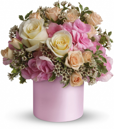 Elegant floral arrangement in a pink vase with white and pink roses, perfect for free delivery in Florida areas.