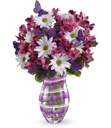 Elegant purple and white floral arrangement in a striped vase, perfect for delivery in Summerfield, Ocala, Orlando, The Villages, and Port St. Lucie.