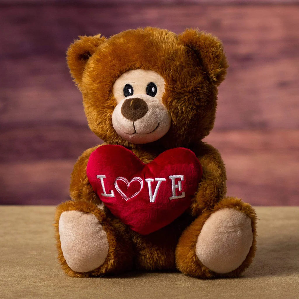 Days Flowers Florida: 9.5-inch hypoallergenic fiber fill teddy bear with 'LOVE' heart. Sweet plush gift delivery in Port St. Lucie, Florida.