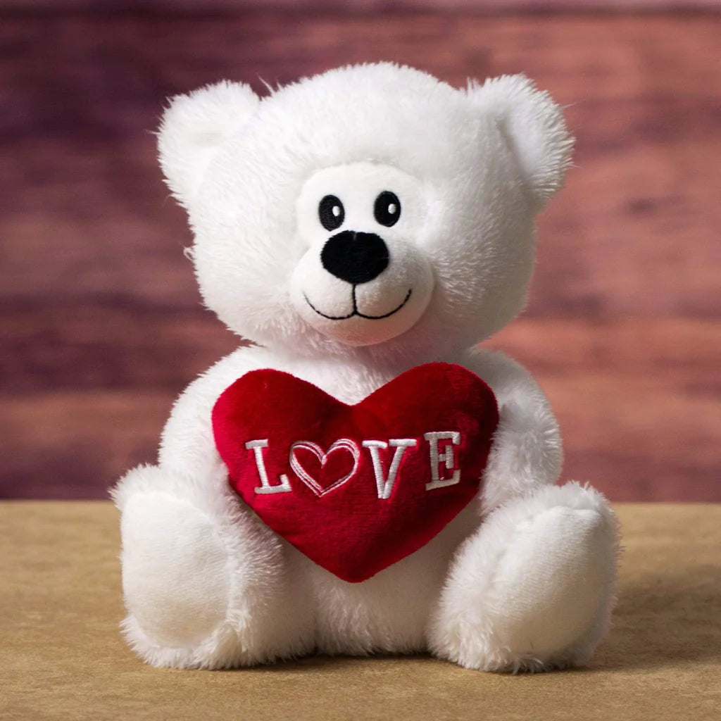 Days Flowers Florida: Soft and cuddly white and brown bear plush. Smiling bear holding 'LOVE' heart. Perfect adorable gift delivery in Summerfield, FL.