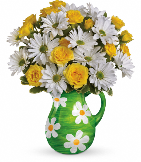 Bright yellow roses and white daisies in a green pitcher vase, perfect for summer delivery in Florida areas like Summerfield, Ocala, Orlando, The Villages, and Port St. Lucie.