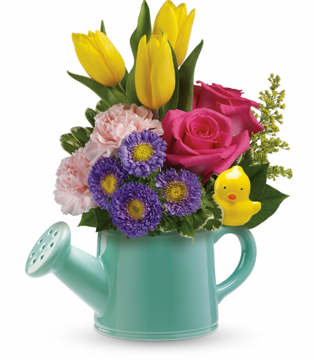 Bright yellow tulips, pink roses, and purple flowers in a teal watering can, perfect for delivery in Summerfield, Ocala, Orlando, The Villages, and Port St. Lucie.