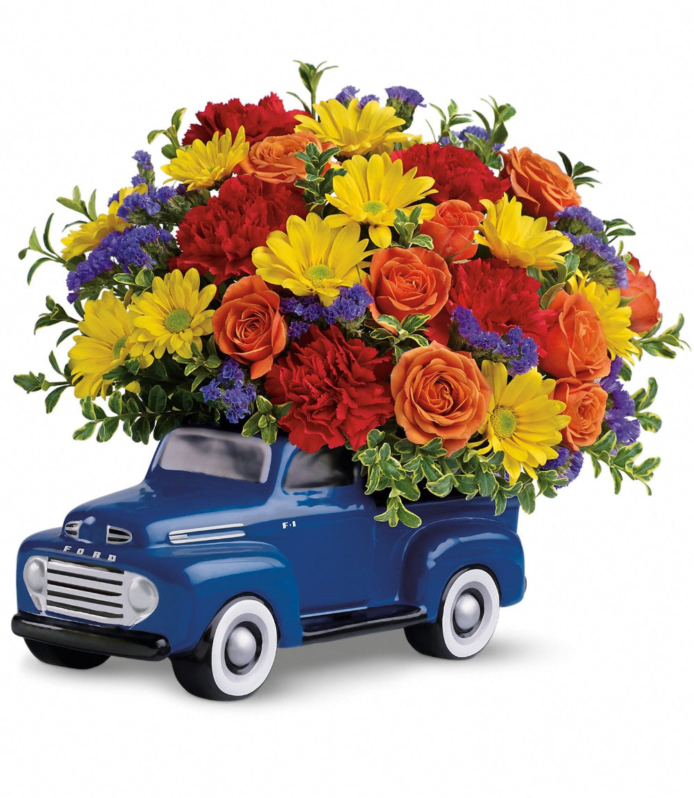 '48 Ford Pickup Bouquet with colorful flowers in a blue truck
